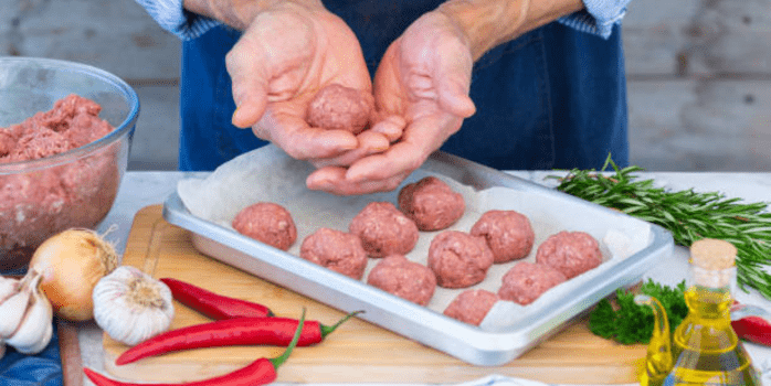 "Step-by-step cooking instructions for reheating Costco chicken meatballs using an oven, stovetop, and microwave, highlighting the ease and convenience of preparation."