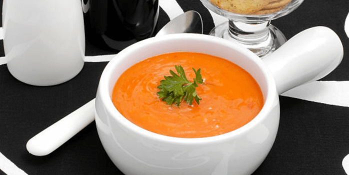 "Discover the unique flavors and ingredients that elevate this smoky chicken tomato bisque." 