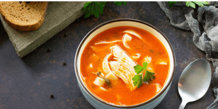 "Different variations of chicken and tomato soup recipes showcasing unique ingredients and flavors." 